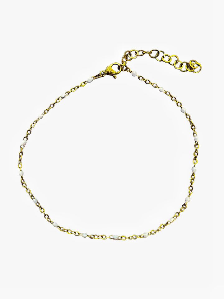Ellegi Bijoux | Cavigliera con sfere bianche in acciaio dorato