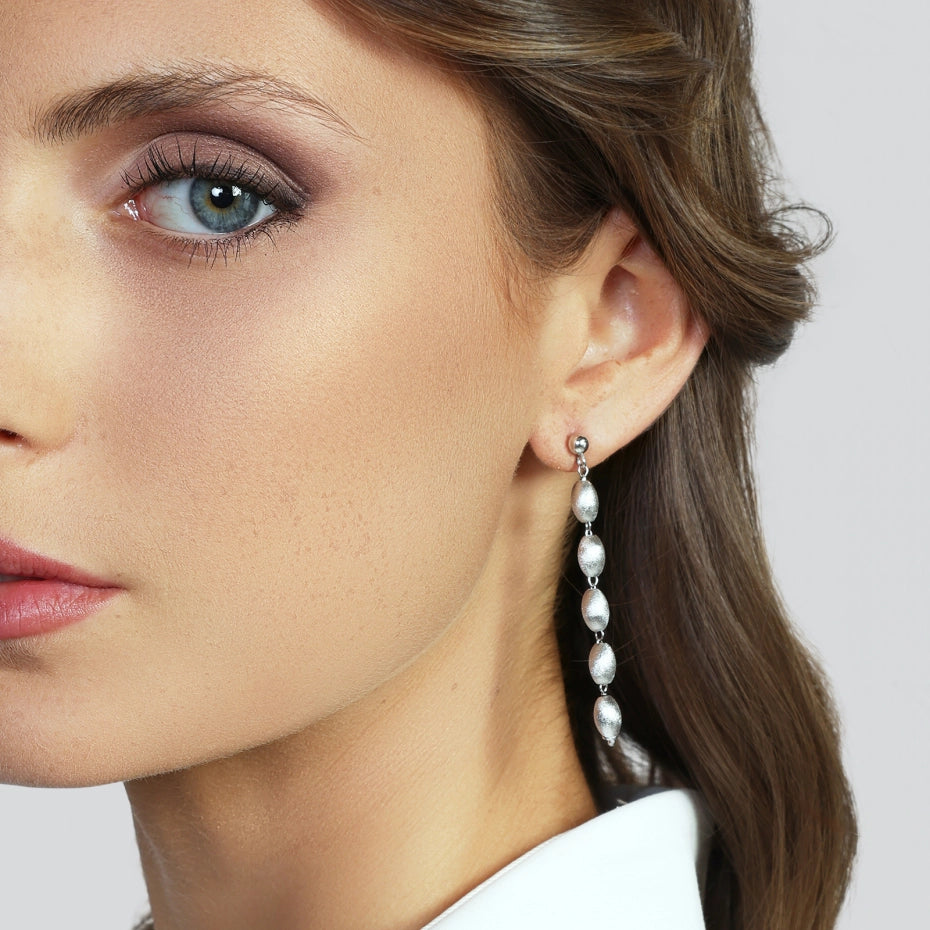 Unoaerre | Orecchini in argento satinato