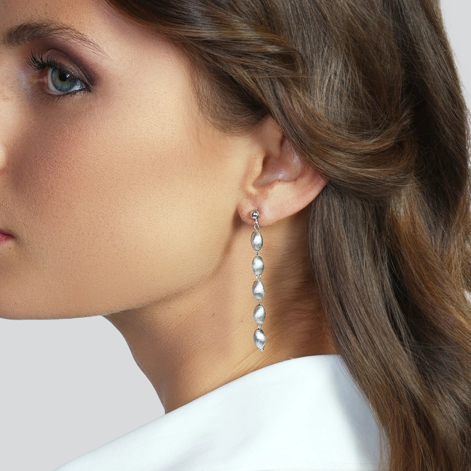 Unoaerre | Orecchini in argento satinato
