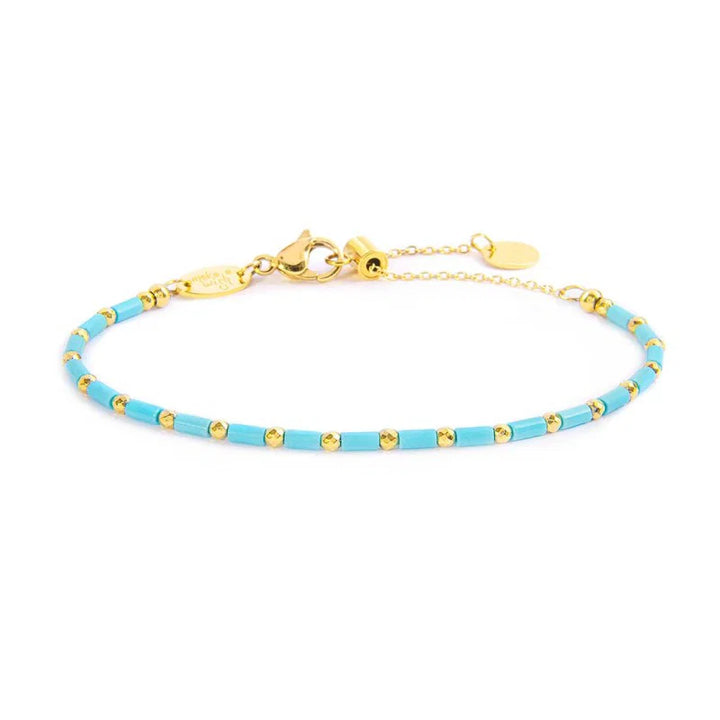 Marlù | Bracciale con perline a tubo turchesi ed ematite
