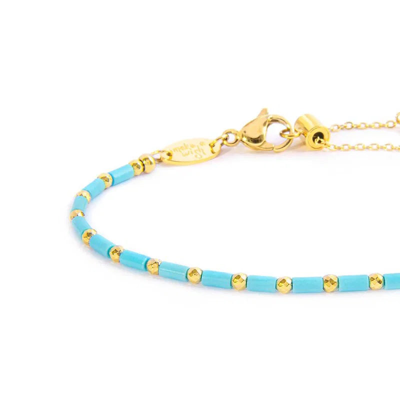 Marlù | Bracciale con perline a tubo turchesi ed ematite