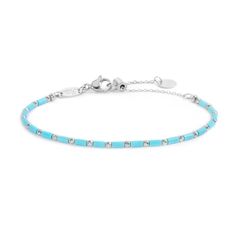 Marlù | Bracciale con perline a tubo turchesi ed ematite