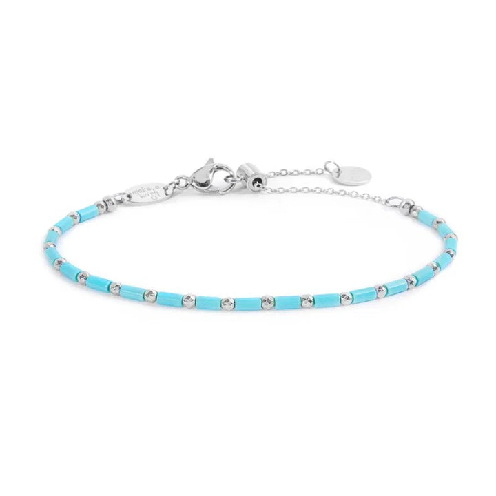Marlù | Bracciale con perline a tubo turchesi ed ematite