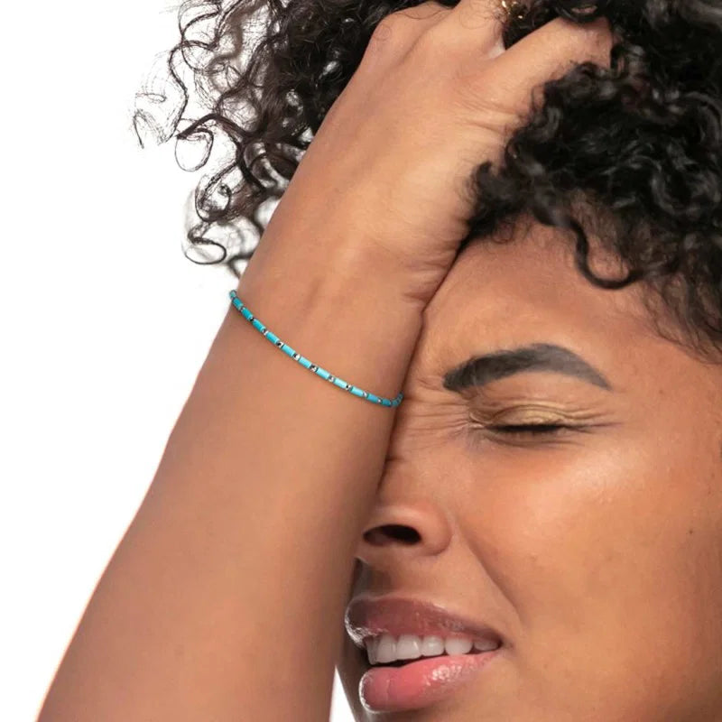 Marlù | Bracciale con perline a tubo turchesi ed ematite