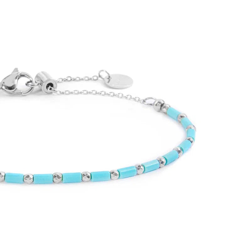 Marlù | Bracciale con perline a tubo turchesi ed ematite