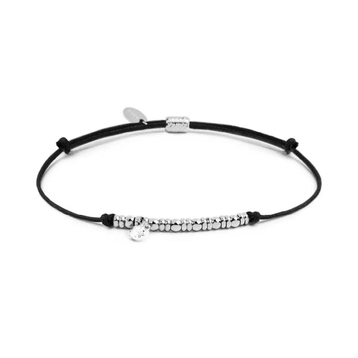 Marlù | Bracciale cordino con elementi acciaio e zircone pendente